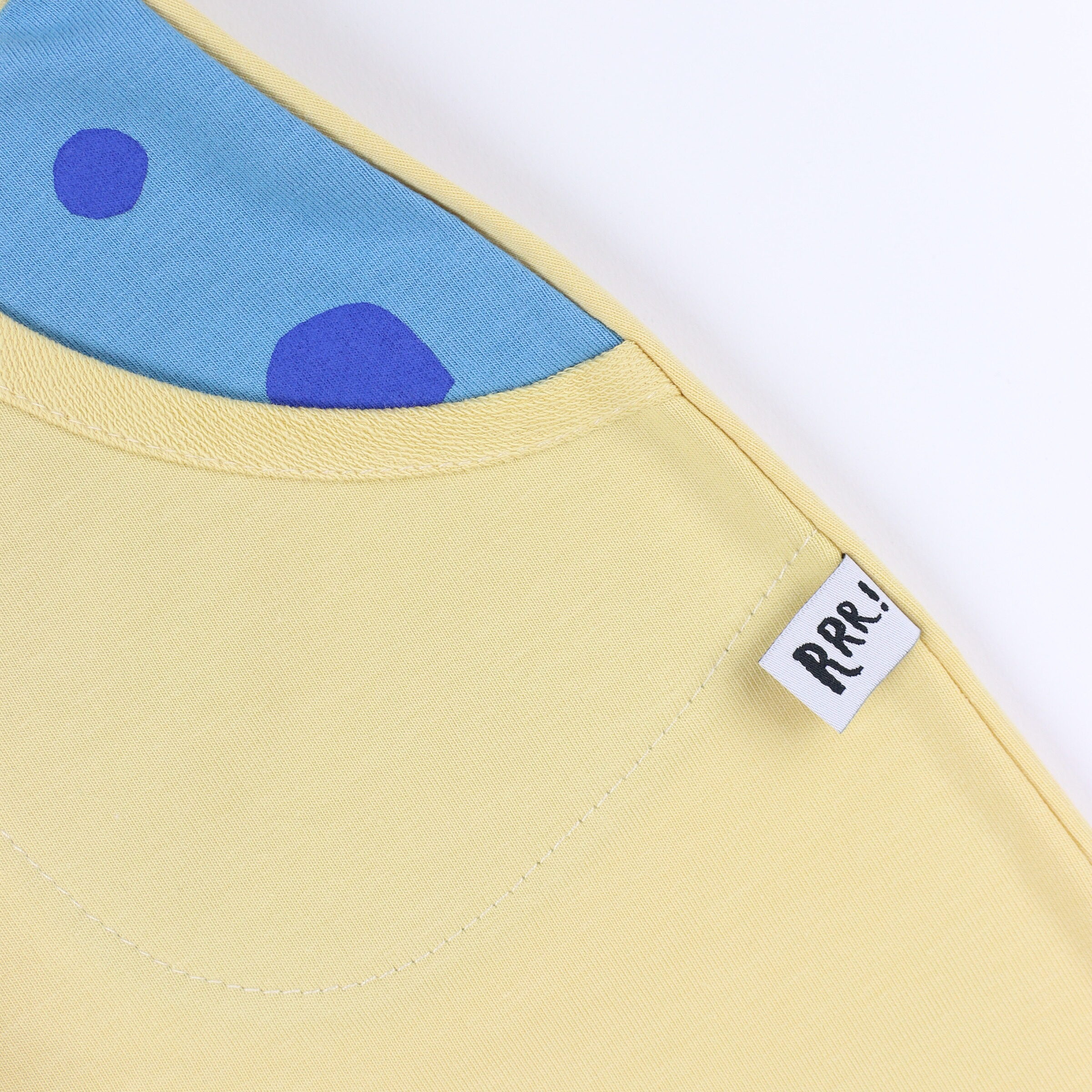 Yellow shorts with polka dot pocket