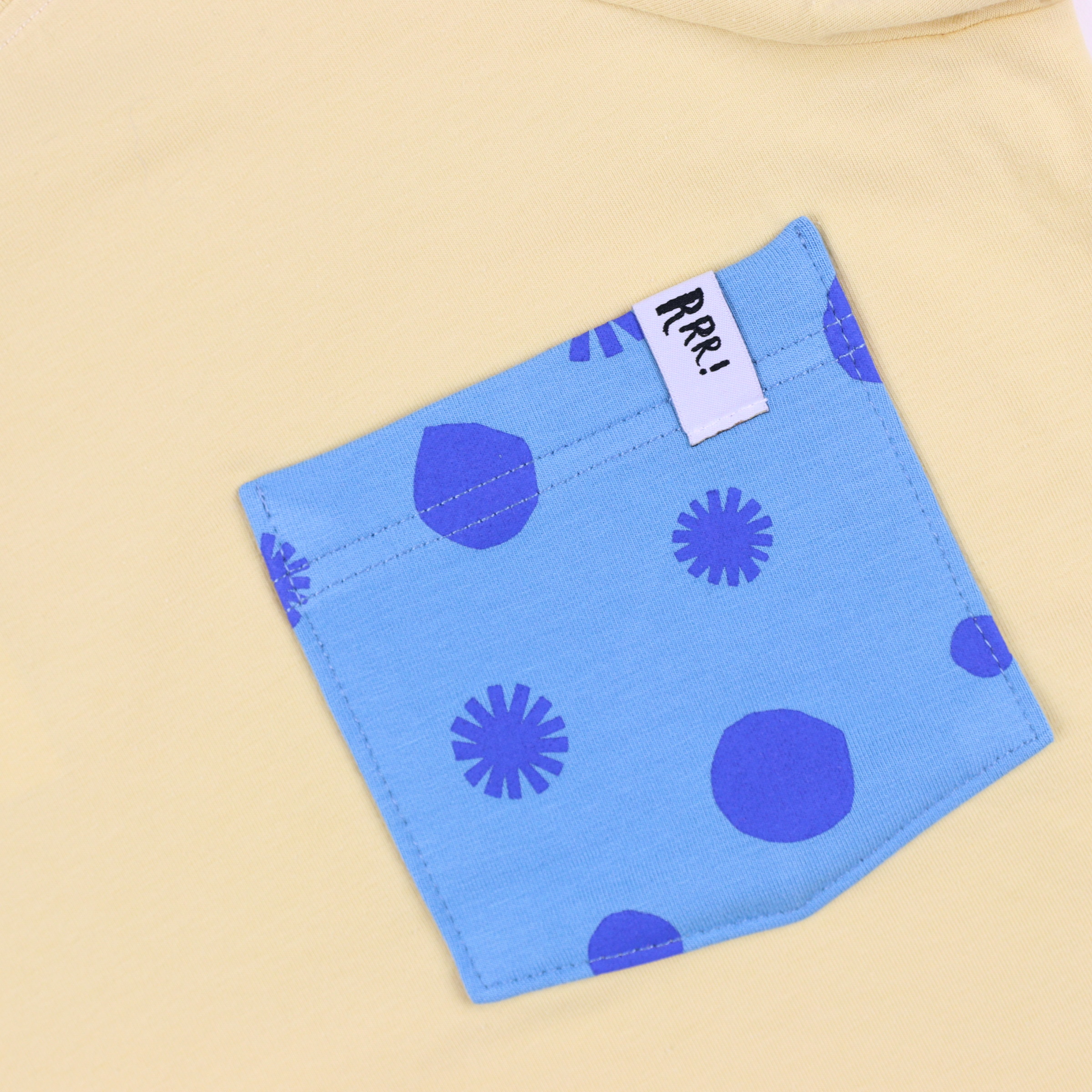 Yellow T-shirt with polka dot pocket